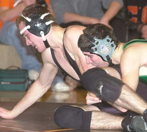 Coldwater's Tyler Kunk, in orange, will be making his first trip to state as a sophomore at the 69th State Wrestling Tournament this week in Columbus. <br></br>dailystandard.com