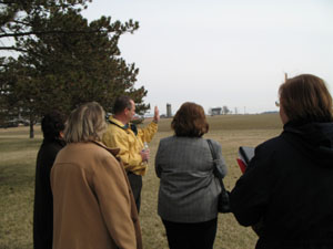 Nick Schulze, a member of the West Ohio Healing Field Committee, shows visitors to the Maria Stein Spiritual Center, where the patriotic observance will take place Sept. 9-12. The 10-acre wheat field will become the temporary home for an expected 3,000 flags.<br></br>dailystandard.com