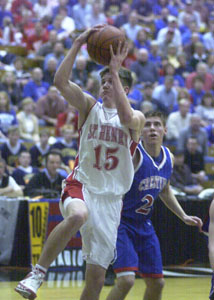 St. Henry's Zack Thobe, 15, goes to the basket for two of his team-high 10 points during the Redskins' Division III district semifinal game at Ohio Northern's Sports Center on Thursday night. St. Henry defeated Crestview, 29-26.<br></br>dailystandard.com