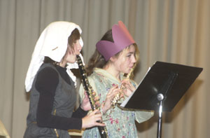 New Bremen sixth-graders Audra Manci and Patricia Latimer perform an instrumental duet during the first annual Medieval Fest.<br></br>dailystandard.com
