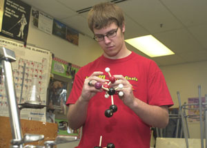 Future scientist Austin Kemper of New Bremen constructs a model chromosome. He has plans to study biochemistry and hopes to earn a doctorate some day.<br></br>dailystandard.com
