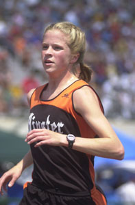 Minster's Bernadette Burke takes part in the 3,200-meter run at the state track meet on Saturday. Burke finished in third place.<br></br>dailystandard.com