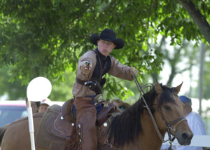 Steve Wilson, 15, of Celina and his horse, Sonny, battle it out for the best time at the Cowboy Mounted Shooting Association's competition held at the Mercer County Fairgrounds on Saturday and Sunday.<br></br>dailystandard.com