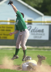 Parkway's Jordan Thompson, bottom, slides safely into second base as Celina's Jimmy Fishpaw, top, leaps to try and make the catch. Celina defeated Parkway, 7-6.. <br></br>dailystandard.com