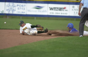 Grand Lake's Kevin Cislo, right, slides into second base for a stolen base as the catcher's throw gets away from Southern Ohio's Adam Yeager, left, during the first inning of their Great Lakes Summer Collegiate League tournament contest at Jim Hoess Field on Thursday afternoon. Grand Lake edged Southern Ohio 2-1 to stay in the winner's bracket.<br></br>dailystandard.com