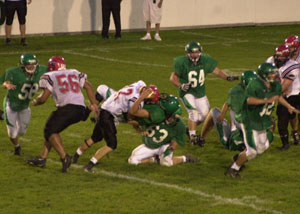 Celina quarterback Derek Gagle is hit hard and sacked by Lima Shawnee's Jesse Norris during their Western Buckeye League contest on Friday night at Celina Stadium. Shawnee rolled past Celina, 47-0.<br></br>dailystandard.com