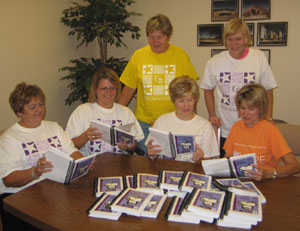 Looking over copies of the newly published 