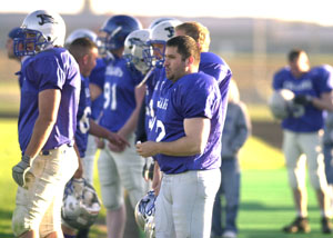 Mercer County's Jose Faller, right foreground, returned to play with the local semi-pro team after spending the last year on active duty in Iraq.<br></br>dailystandard.com