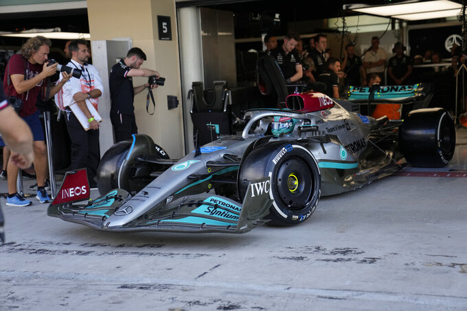 Mercedes driver Lewis Hamilton of Britain leaves the pit lane during practice for thethe Formula One Abu Dhabi Grand Prix, in Abu Dhabi, United Arab Emirates Friday, Nov. 18, 2022. (AP Photo/Hussein Malla)