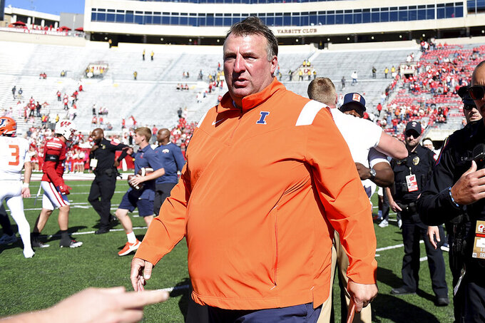 Illinois head coach Bret Bielema walks off the field following a 34-10 win over Wisconsin in an NCAA college football game Saturday, Oct. 1, 2022, in Madison, Wis. (AP Photo/Kayla Wolf)