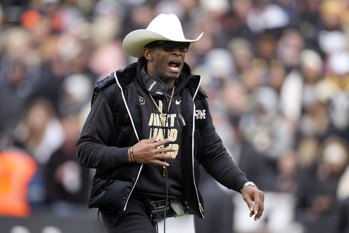FILE - Colorado head coach Deion Sanders in the first half of the team's spring practice NCAA college football game Saturday, April 22, 2023, in Boulder, Colo. Scouting and recruiting players in the NCAA transfer portal has become a vital part of building a college football program. Sanders’ team has added 20 transfers since the portal window opened April 15. (AP Photo/David Zalubowski, File)
