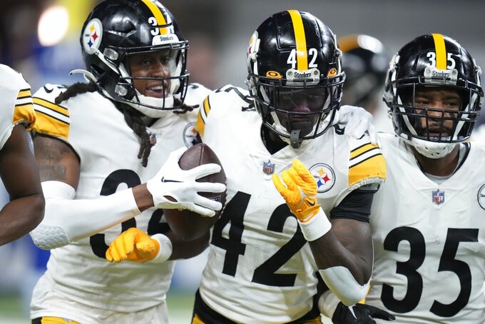 Pittsburgh Steelers cornerback James Pierre (42) celebrates an interception during the first half of an NFL football game against the Indianapolis Colts, Monday, Nov. 28, 2022, in Indianapolis. (AP Photo/Michael Conroy)