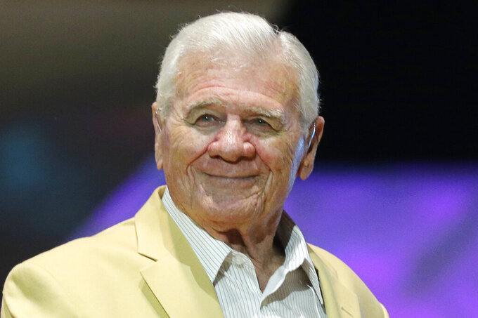 FILE - Hugh McElhenny is introduced before the inaugural Pro Football Hall of Fame Fan Fest ,Friday, May 2, 2014, at the International Exposition Center in Cleveland. NFL Hall of Famer Hugh McElhenny, an elusive running back from the 1950s has died. He was 93. The Pro Football Hall of Fame said in a news release that McEhlenny died of natural causes on June 17 at his home in Nevada, and that son-in-law Chris Permann confirmed the death. (AP Photo/Mark Duncan, File)