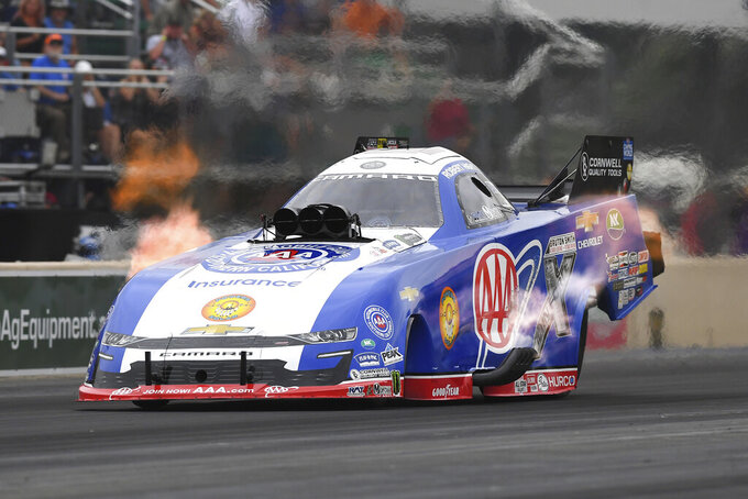 In this photo provided by the NHRA, Funny Car's Robert Hight wins at Summit Racing Equipment Motorsports Park in Norwalk, Ohio, Sunday, June 26, 2022, in his Chevrolet Camaro at the Summit Racing Equipment NHRA Nationals. (Marc Gewertz/NHRA via AP)
