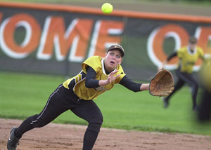 Parkway's Elaine Crowell tries to make a diving catch during Division III district semifinal softball action at Elida on Thursday. Parkway completed its suspended game against Coldwater with a 4-0 victory.<br></br>dailystandard.com
