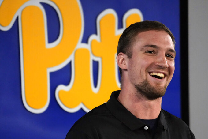 University of Pittsburgh quarterback Phil Jurkovec is introduced during an NCAA college football news conference in Pittsburgh, Wednesday, Jan. 25, 2023. The well-traveled quarterback is returning to his hometown to play for Pat Narduzzi at Pitt after stops at Notre Dame and Boston College. (AP Photo/Gene J. Puskar)