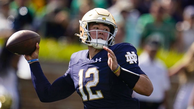 FILE - Notre Dame quarterback Tyler Buchner (12) throws against Marshall during the first half of an NCAA college football game in South Bend, Ind., Saturday, Sept. 10, 2022. Notre Dame transfer Tyler Buchner has committed to Alabama, where he will be reunited with former Fighting Irish offensive coordinator Tommy Rees. Buchner announced his decision in a Twitter post Thursday, April 27, 2023. (AP Photo/Michael Conroy, File)