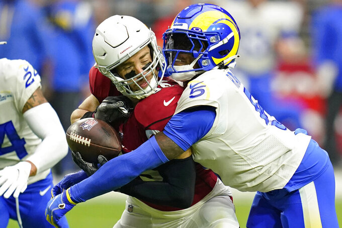 Los Angeles Rams cornerback Jalen Ramsey (5) breaks up a pass intended for Arizona Cardinals tight end Zach Ertz (86) during the first half of an NFL football game, Sunday, Sept. 25, 2022, in Glendale, Ariz. (AP Photo/Ross D. Franklin)