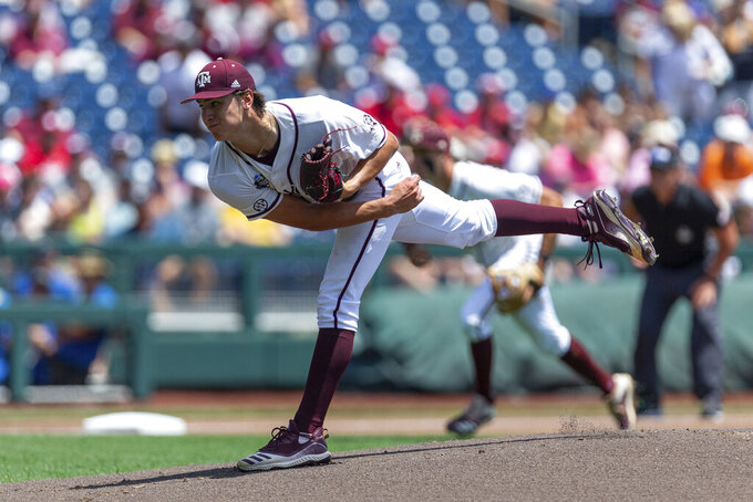 Texas A&M starting pitcher Nathan Dettmer (35) throws a pitch against Oklahoma in the first inning during an NCAA College World Series baseball game Friday, June 17, 2022, in Omaha, Neb. (AP Photo/John Peterson)